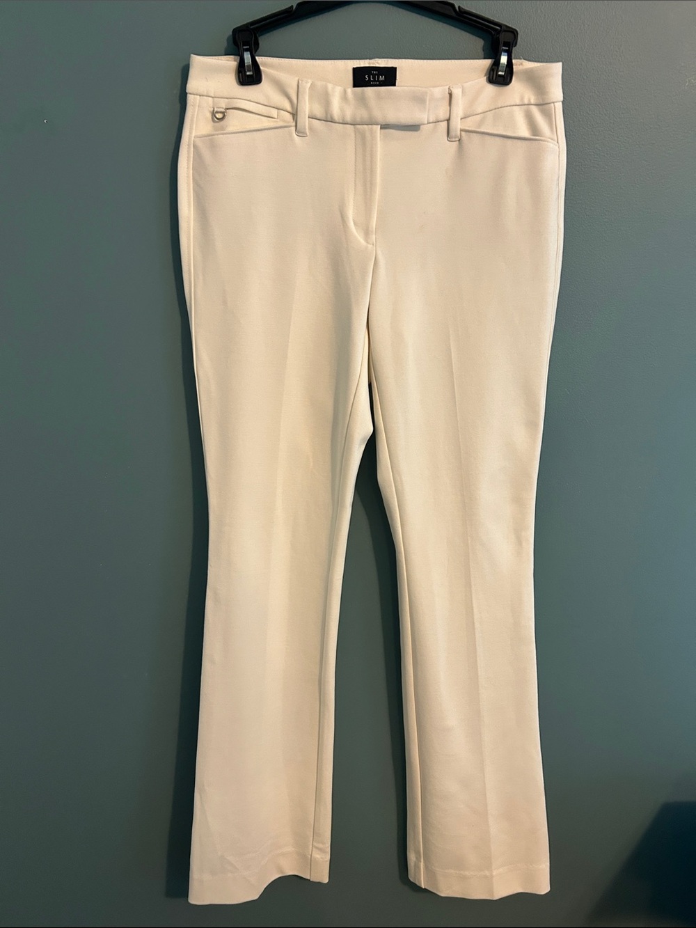 White House Black Market The Slim Boot dress pants in good condition. Size 4